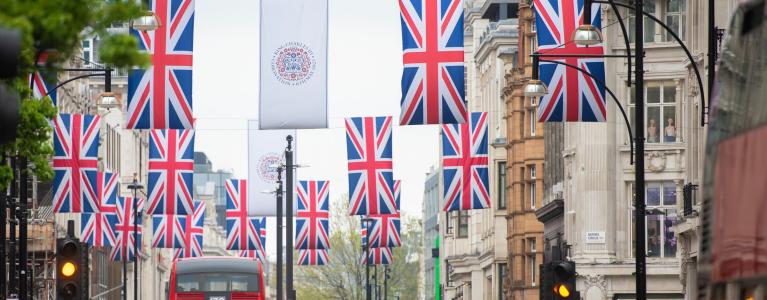 A major London high street dressed in Union Jacks and Coronation flags.