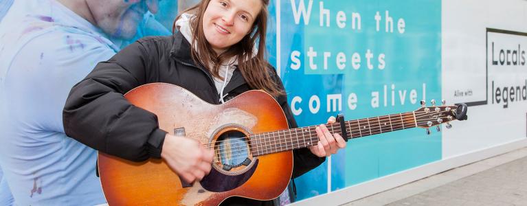 Nicola Hogg Busking at Wembley Park. Photo by Gary W Smith.