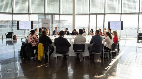 Skills for Londoners Business Partnership members discussing at a round table