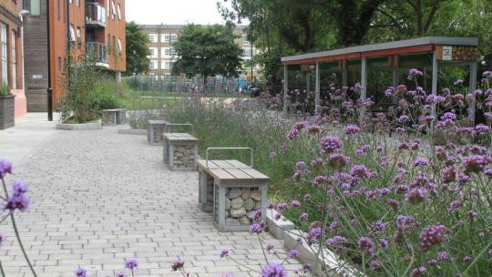 A range of sustainable drainage measures have been installed in Derbyshire Street pocket park, Tower Hamlets. These include green roofs, permeable paving, swales and rain gardens.