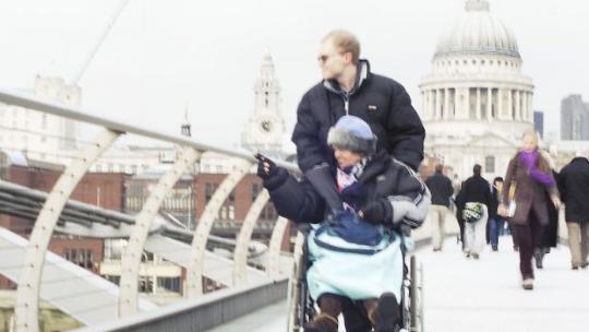 Wheelchair user on the millennium bridge