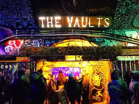 The Vaults front shop with people