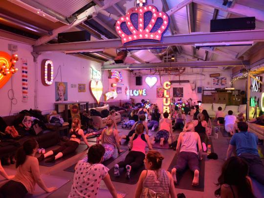 People practising yoga at God's own junkwayd in walthamstow