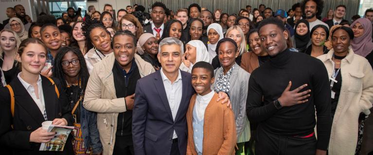 Sadiq Khan and young people posing for picture at YPAG event