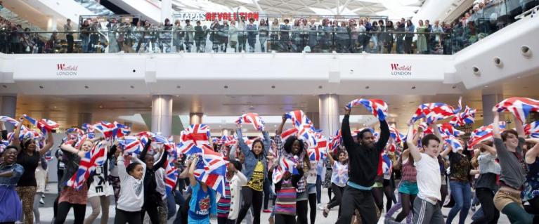 People holding British flag