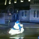 Met police officers pursue a moped shortly before making an arrest