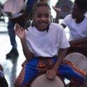 Black children playing drums