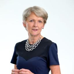 Headshot of woman in front of white background