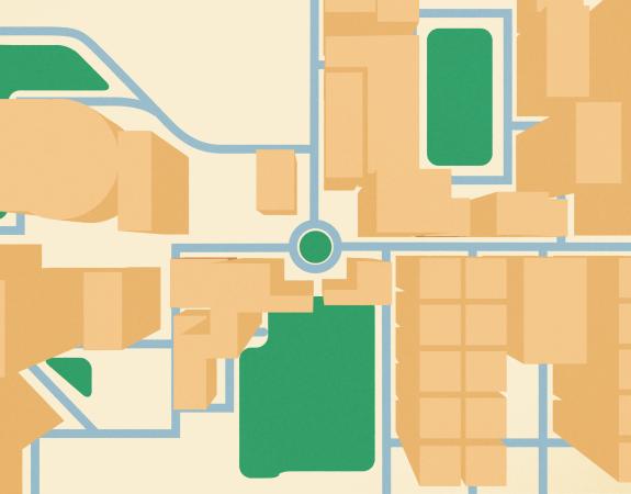 Illustration. Birds eye view of part of city showing a road network, buildings and green spaces