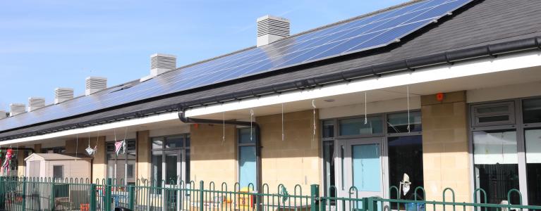 Solar panel mounted on the roof of school building