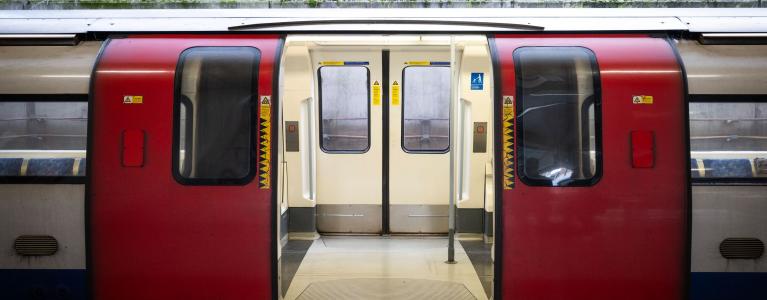 Image of two open doors on a London underground train