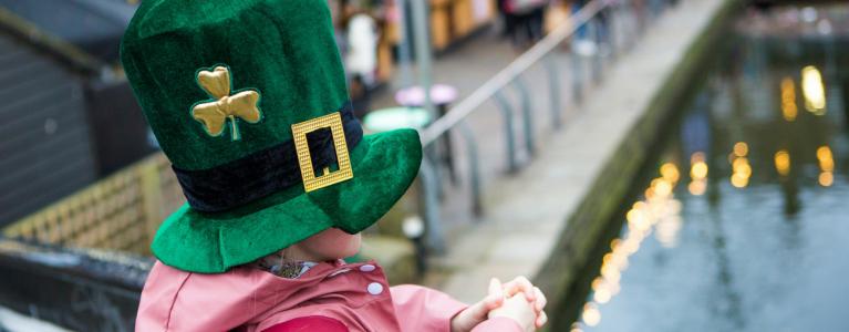 Boy in shamrock hat in Camden