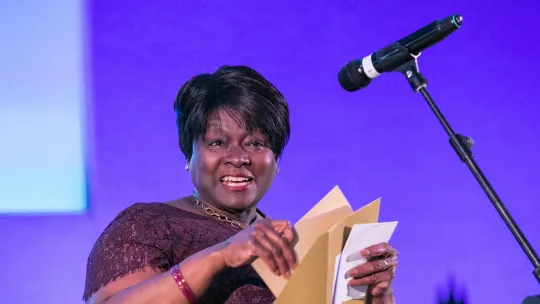 Person announcing winner at Team London Volunteering Awards 2018