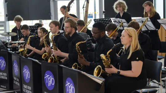 young people playing in an orchestra