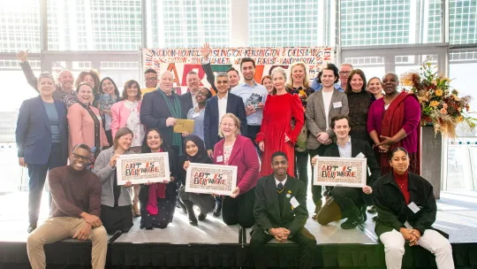 People posing for photo at London Borough of Culture event in City Hall