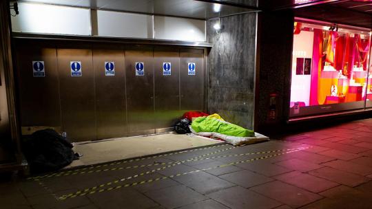 A homeless person, rough sleeping in London.
