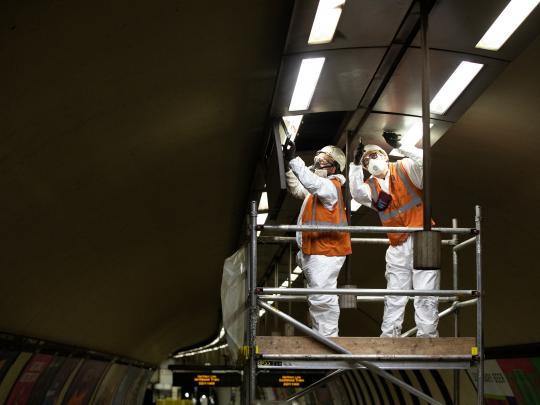 Men working on tube tunnel at Clapham North station