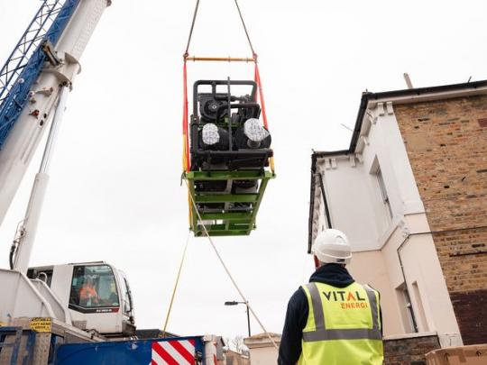 Water source heat pumps being lifted with crane at Southwark