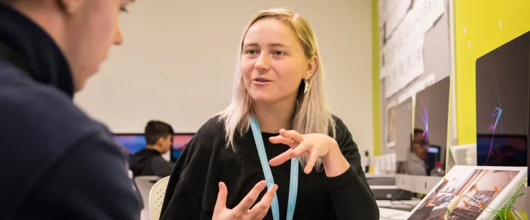 Tutor talking to a young person