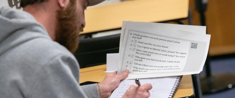 Man completing a test at Sutton College