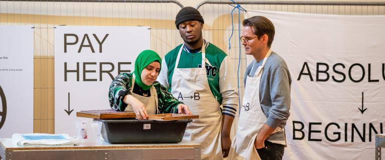 Three people working on Absolute Beginners project