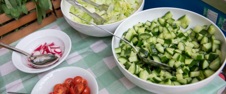 Chopped vegetables in bowls.