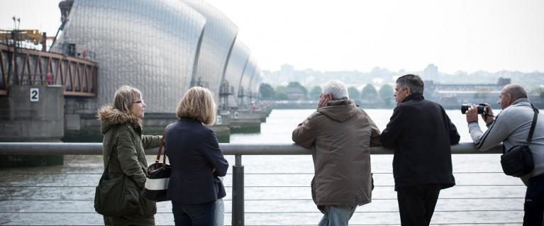 People looking at the Thames Barrier