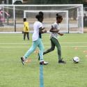 Kids playing football